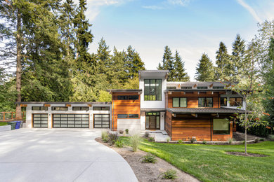 Home design - large modern home design idea in Seattle