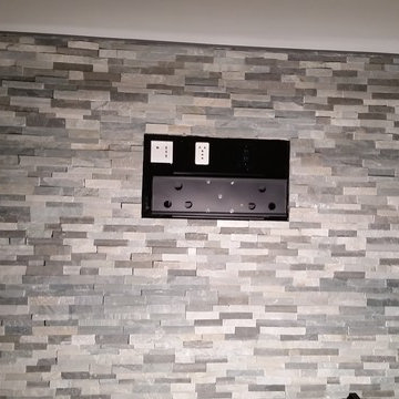 Natural stone accent wall With TV mount & with wires in wall
