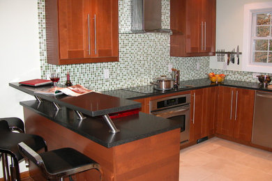 Example of a mid-sized trendy u-shaped ceramic tile open concept kitchen design in Nashville with an undermount sink, shaker cabinets, medium tone wood cabinets, granite countertops, gray backsplash, ceramic backsplash, stainless steel appliances and a peninsula