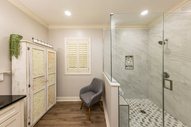 Example of a classic laminate floor and brown floor bathroom design in Columbus with gray walls