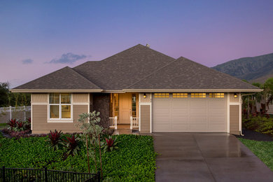 Example of a mid-sized trendy beige one-story vinyl exterior home design in Hawaii