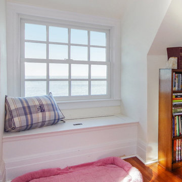 Double Hung Window with Grilles in Cozy Bedroom - Renewal by Andersen Long Islan