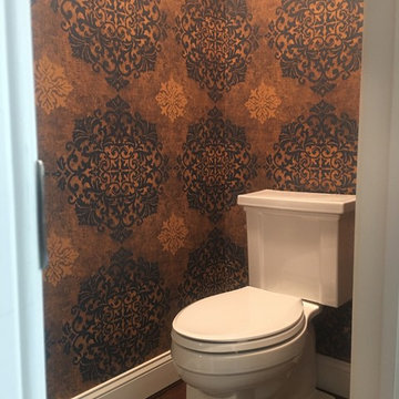 Elegant wallpaper in half bath