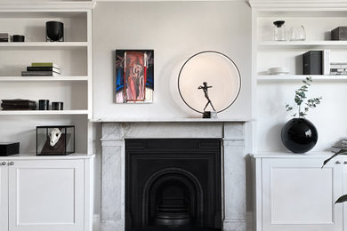 Trendy living room photo in London with no tv