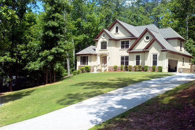 Photo of a traditional home design in Atlanta.