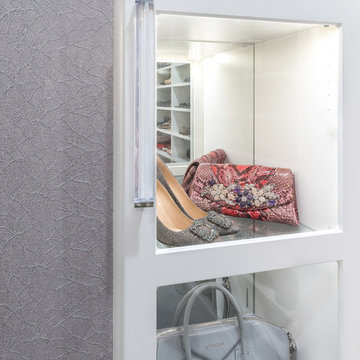 Dazzling Transitional His and Hers Master Closets