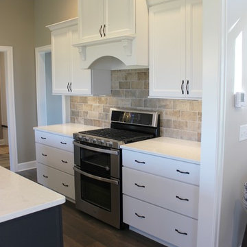 Blue Kitchen Island in Edgebrooke Homes Bettendorf, Iowa Kitchen