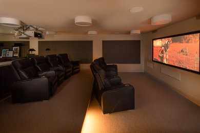 This is an example of a contemporary home cinema in Buckinghamshire.
