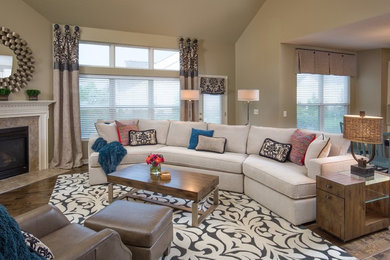 Mid-sized minimalist open concept medium tone wood floor family room photo in Columbus with green walls, a standard fireplace, a tile fireplace and a media wall