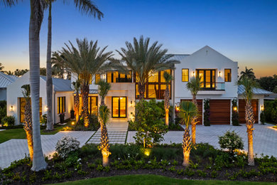 Example of a transitional exterior home design in Miami