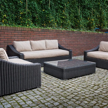 Toja Patio Furniture - Tuscan Couch Set - Red Brick Wall