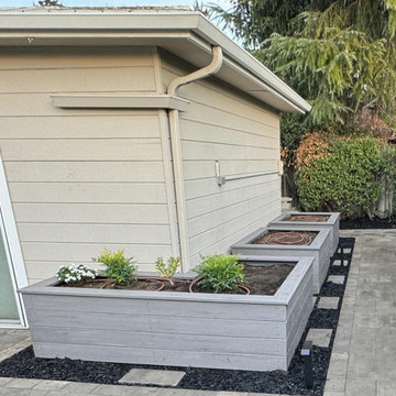 Campbell backyard with timbertech planters