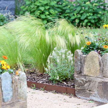 Colorful front yard, dog friendly backyard.