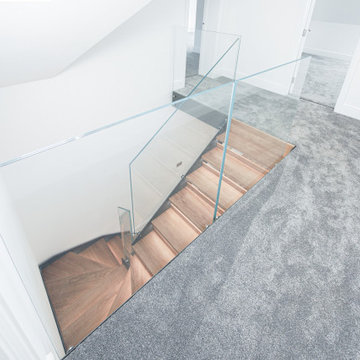 STUNNING INTERNAL GREY METAL STAIRCASE WITH LED STAIR LIGHTS