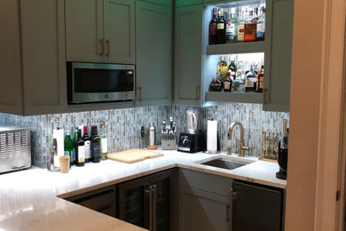 Inspiration for a coastal home bar remodel in Other