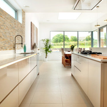 Open plan cashmere kitchen dining with island
