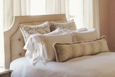 Mid-sized trendy bedroom photo in New York with brown walls