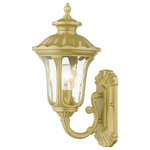 Livex Lighting - Oxford 1-Light Soft Gold Outdoor Small Wall Lantern - From the Oxford outdoor lantern collection, this traditional cast aluminum upward facing single-light small wall lantern design will add curb appeal to any home. It features a handsome, antique-style wall plate and decorative arm. Clear water glass casts an appealing light and lends to its vintage charm. The wall plate, arm and other details are all in a soft gold finish. With superb craftsmanship and affordable price, this fixture is sure to tastefully indulge your senses.