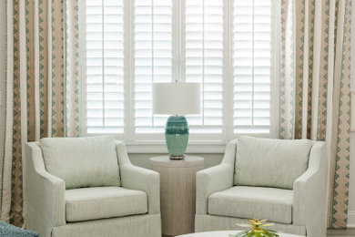 Example of a beach style living room design in Charleston