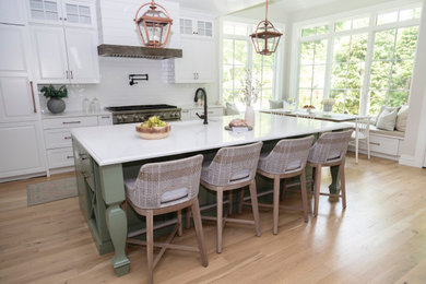 Inspiration for a large single-wall eat-in kitchen remodel in Boston with an island