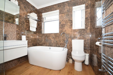 Inspiration for a modern bathroom remodel in Sussex