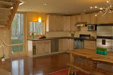 Eat-in kitchen - large rustic l-shaped concrete floor and brown floor eat-in kitchen idea in Providence with shaker cabinets, light wood cabinets, stainless steel appliances and no island