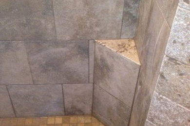 Example of a transitional bathroom design in Other