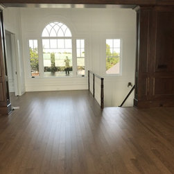 Gorgeous Second Floor Window with Neutral Floors - Hardwood Flooring