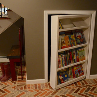 Design ideas for a medium sized traditional walk-out basement in Other with grey walls, ceramic flooring and red floors.