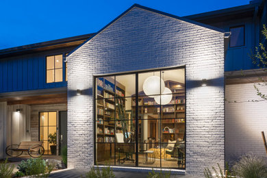 Example of a transitional exterior home design in Denver
