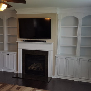 Double-Ached Fluted-Trim Fireplace Built-ins