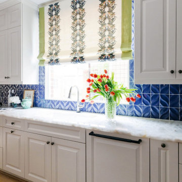 Vibrant Kitchen Remodel in Houston, TX with Custom Blue Tile Accents
