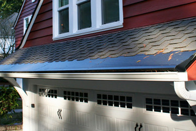 Inspiration for a mid-sized modern red two-story wood exterior home remodel in Minneapolis