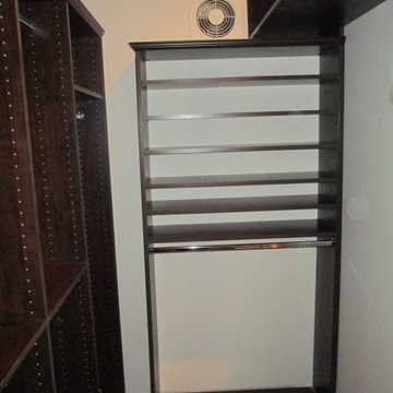 Chocolate Pearwood long narrow master walk in closet