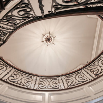 Project #74 | Circular Staircase with Hand-Forged Metal Panels