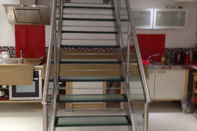 This is an example of a medium sized contemporary staircase in Hertfordshire.