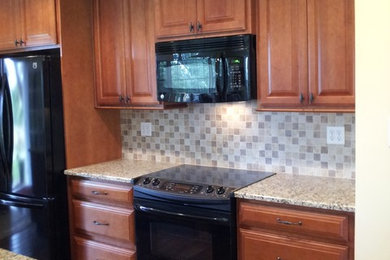 Example of a classic kitchen design in Other