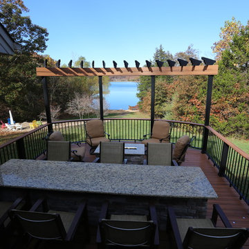 Custom curved, multilevel deck with bar and firepit - Innsbrook, MO