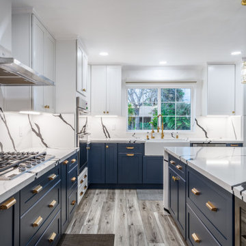Modern Transitional Kitchen with Navy Blue Cabinets by The Cabination