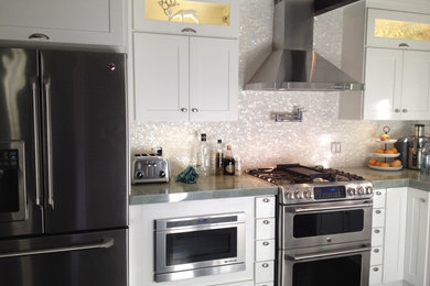 Inspiration for an eclectic kitchen remodel in New York with white backsplash