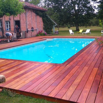 Aménagement terrasse bois en Cumaru avec margelles en Ipé