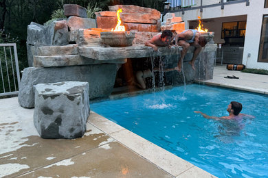 Mountain style pool photo in Austin