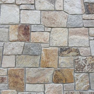 Combining Colonial Tan Natural Stone with Olive Green Siding
