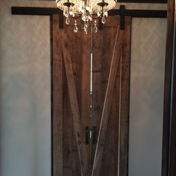 Double Sliding Antique Reclaimed Wood Barn Doors in an Elegant Hall - Interior Doors