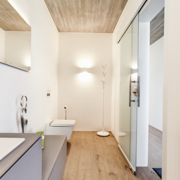 gastliches Gäste-WC mit Glasschiebetür