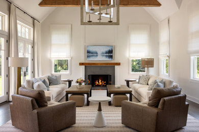 Inspiration for a mid-sized transitional formal and enclosed dark wood floor living room remodel in New York with white walls, a standard fireplace and a metal fireplace