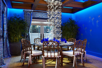 Example of an eclectic dining room design in Miami