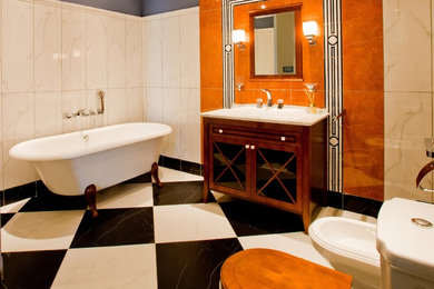 Example of a large 1950s master freestanding bathtub design in Los Angeles with a drop-in sink and a one-piece toilet
