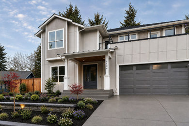 Inspiration for a large contemporary two-story mixed siding exterior home remodel with a shingle roof