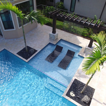 Geometric Swimming Pool with numerous water features